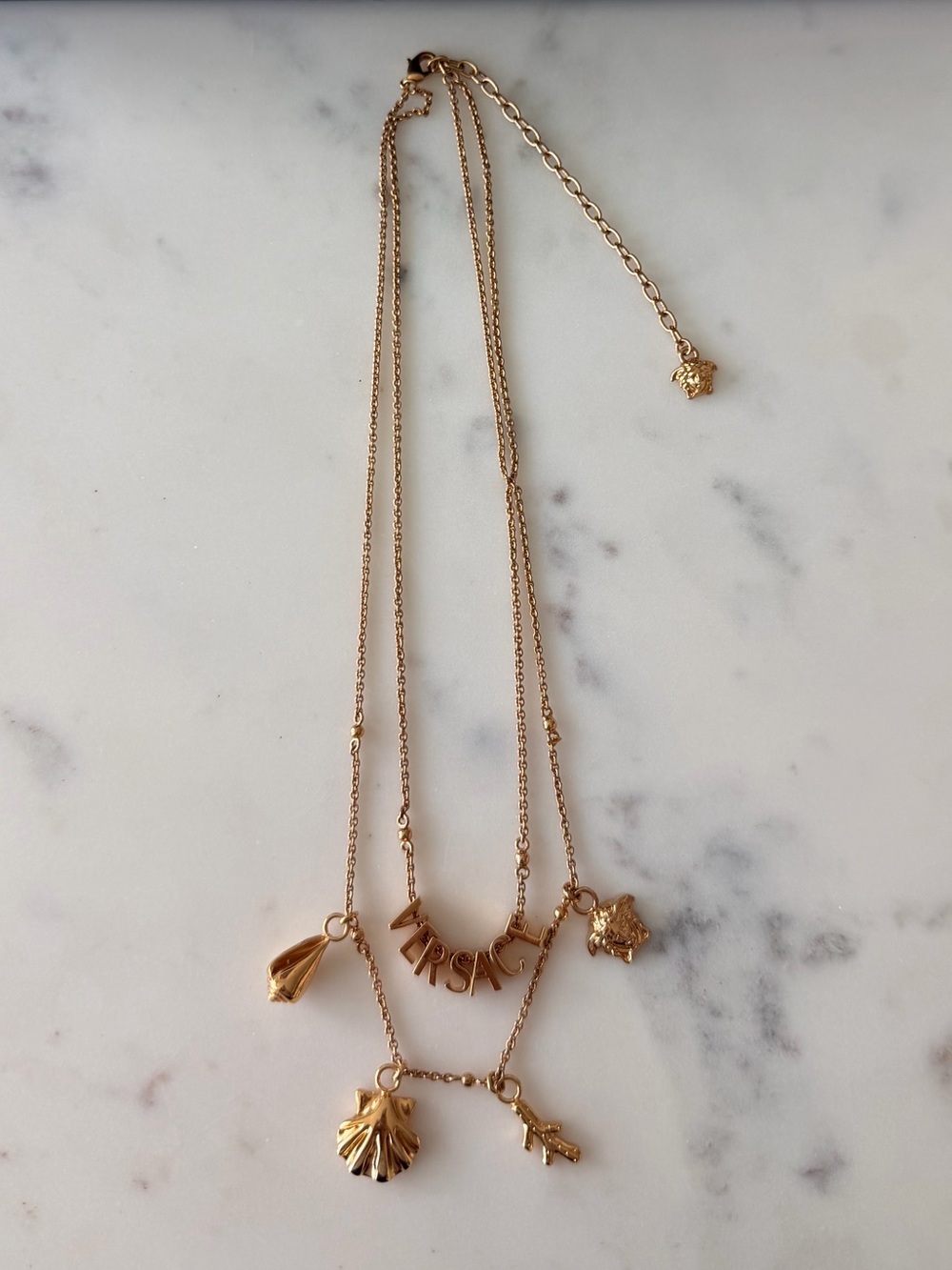 Versace Gold Tone Logo Lettering Charm Necklace Medusa Seashell Coral